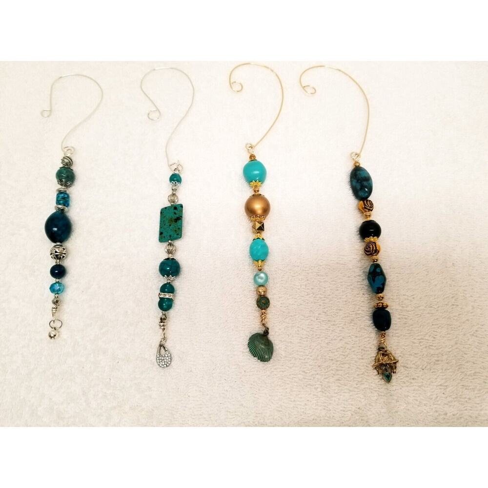 Four turqouis Christmas icicle ornaments c14